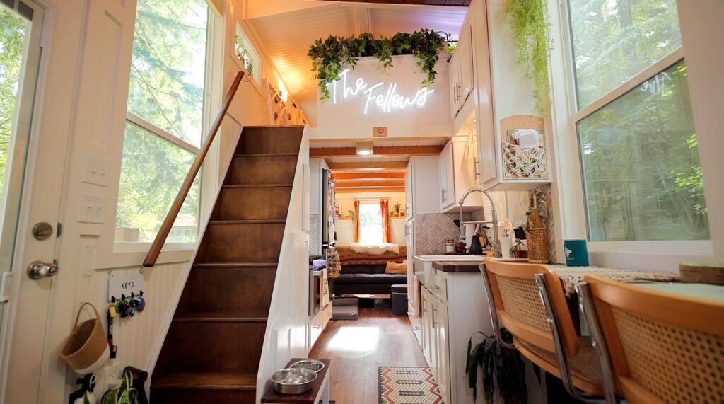 http://tinyhouseexpedition.com/wp-content/uploads/2022/12/love-their-tiny-house-_-water-leak-_-interior-1024x571.jpg